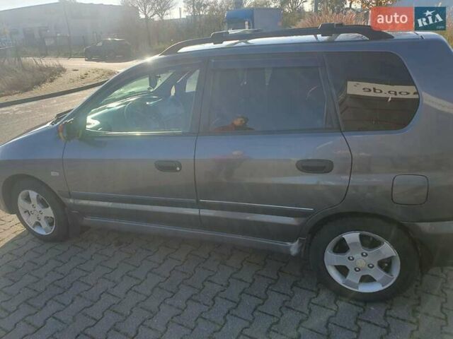 Серый Мицубиси Спейс Стар, объемом двигателя 1.6 л и пробегом 204 тыс. км за 1500 $, фото 2 на Automoto.ua