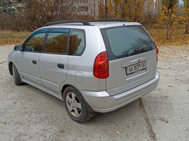 Серый Мицубиси Спейс Стар, объемом двигателя 1.8 л и пробегом 370 тыс. км за 2900 $, фото 1 на Automoto.ua