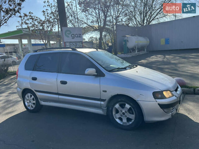 Сірий Міцубісі Спейс Стар, об'ємом двигуна 1.6 л та пробігом 200 тис. км за 1999 $, фото 5 на Automoto.ua