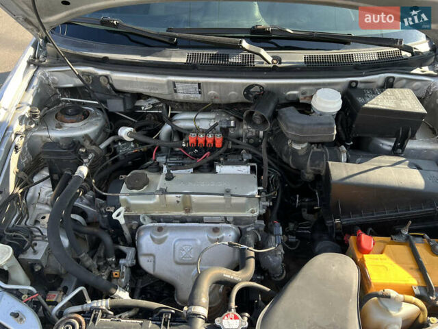 Сірий Міцубісі Спейс Стар, об'ємом двигуна 1.6 л та пробігом 200 тис. км за 1999 $, фото 12 на Automoto.ua