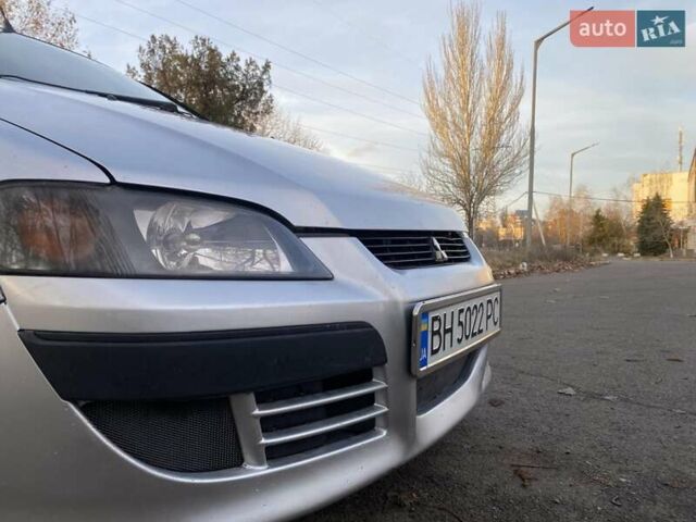 Сірий Міцубісі Спейс Стар, об'ємом двигуна 1.58 л та пробігом 250 тис. км за 2800 $, фото 7 на Automoto.ua