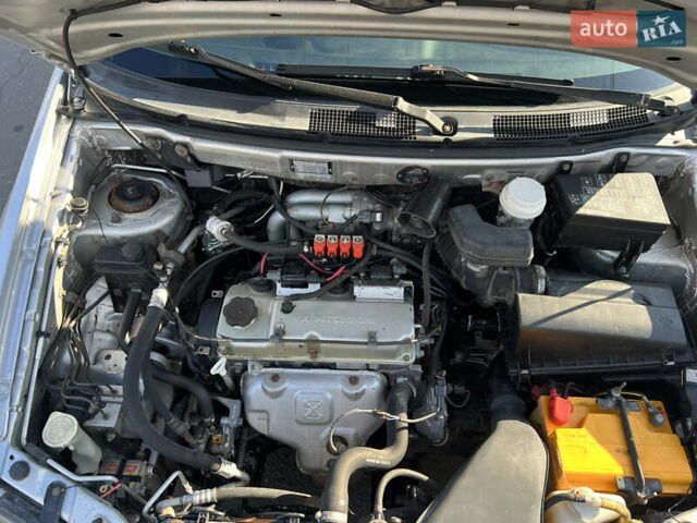 Сірий Міцубісі Спейс Стар, об'ємом двигуна 1.6 л та пробігом 200 тис. км за 1999 $, фото 9 на Automoto.ua