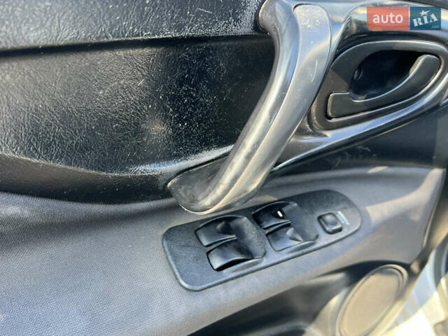 Сірий Міцубісі Спейс Стар, об'ємом двигуна 1.6 л та пробігом 200 тис. км за 1999 $, фото 8 на Automoto.ua