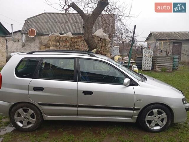 Серый Мицубиси Спейс Стар, объемом двигателя 1.8 л и пробегом 199 тыс. км за 2675 $, фото 1 на Automoto.ua