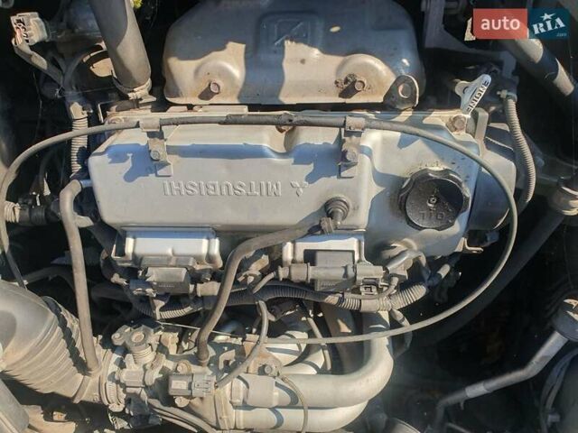 Серый Мицубиси Спейс Стар, объемом двигателя 1.6 л и пробегом 204 тыс. км за 1500 $, фото 5 на Automoto.ua
