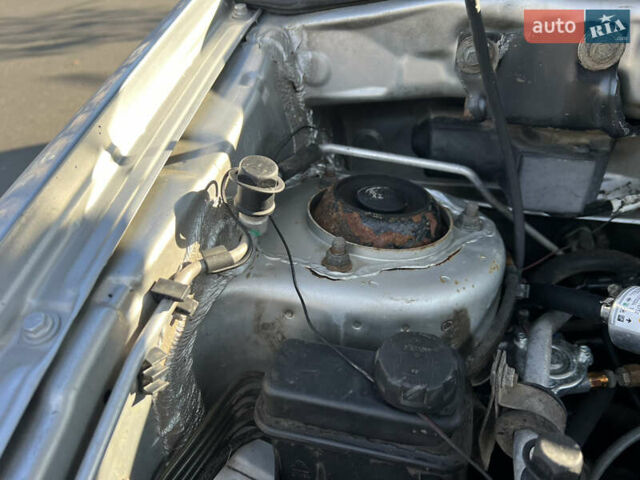 Сірий Міцубісі Спейс Стар, об'ємом двигуна 1.6 л та пробігом 200 тис. км за 1999 $, фото 11 на Automoto.ua