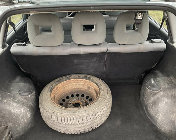 Сірий Міцубісі Спейс Стар, об'ємом двигуна 1.58 л та пробігом 295 тис. км за 2750 $, фото 15 на Automoto.ua