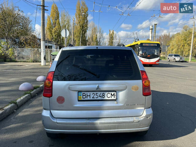 Сірий Міцубісі Спейс Стар, об'ємом двигуна 1.6 л та пробігом 200 тис. км за 1999 $, фото 4 на Automoto.ua