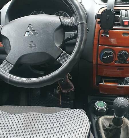 Сірий Міцубісі Спейс Стар, об'ємом двигуна 1.6 л та пробігом 208 тис. км за 3550 $, фото 20 на Automoto.ua