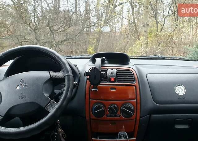 Сірий Міцубісі Спейс Стар, об'ємом двигуна 1.6 л та пробігом 208 тис. км за 3550 $, фото 15 на Automoto.ua