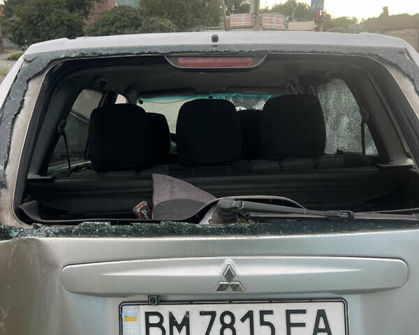 Мицубиси Спейс Стар 2004 в Сумах на Automoto.ua Серый Мицубиси Спейс Стар, объемом двигателя 1.58 л и пробегом 300 тыс. км за 1000 $, фото 2 на Automoto.ua