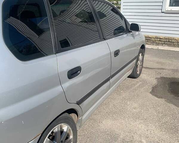 Серый Мицубиси Спейс Стар, объемом двигателя 1.58 л и пробегом 265 тыс. км за 3700 $, фото 5 на Automoto.ua