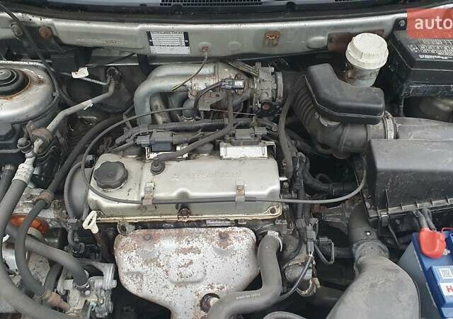 Сірий Міцубісі Спейс Стар, об'ємом двигуна 1.6 л та пробігом 208 тис. км за 3550 $, фото 25 на Automoto.ua