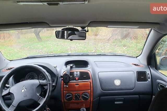 Сірий Міцубісі Спейс Стар, об'ємом двигуна 1.6 л та пробігом 208 тис. км за 3550 $, фото 16 на Automoto.ua