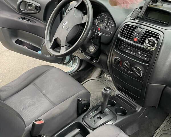 Сірий Міцубісі Спейс Стар, об'ємом двигуна 1.83 л та пробігом 141 тис. км за 4700 $, фото 8 на Automoto.ua