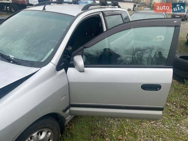 Серый Мицубиси Спейс Стар, объемом двигателя 1.6 л и пробегом 151 тыс. км за 2300 $, фото 3 на Automoto.ua