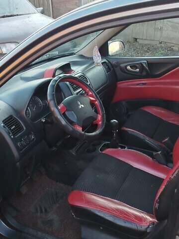 Сірий Міцубісі Спейс Стар, об'ємом двигуна 1.6 л та пробігом 34 тис. км за 3200 $, фото 5 на Automoto.ua