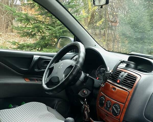 Сірий Міцубісі Спейс Стар, об'ємом двигуна 1.6 л та пробігом 208 тис. км за 3550 $, фото 13 на Automoto.ua