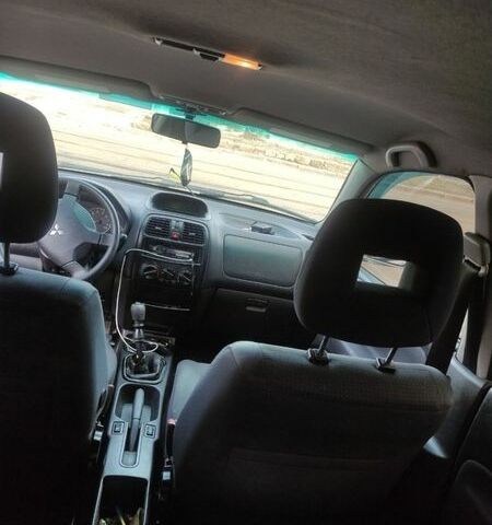 Серый Мицубиси Спейс Стар, объемом двигателя 1.58 л и пробегом 320 тыс. км за 3000 $, фото 2 на Automoto.ua