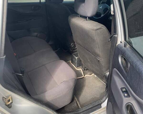 Серый Мицубиси Спейс Стар, объемом двигателя 1.58 л и пробегом 265 тыс. км за 3700 $, фото 8 на Automoto.ua