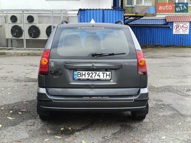 Серый Мицубиси Спейс Стар, объемом двигателя 1.6 л и пробегом 227 тыс. км за 2600 $, фото 4 на Automoto.ua
