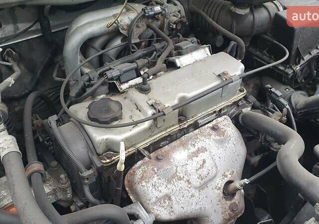 Сірий Міцубісі Спейс Стар, об'ємом двигуна 1.6 л та пробігом 208 тис. км за 3550 $, фото 26 на Automoto.ua