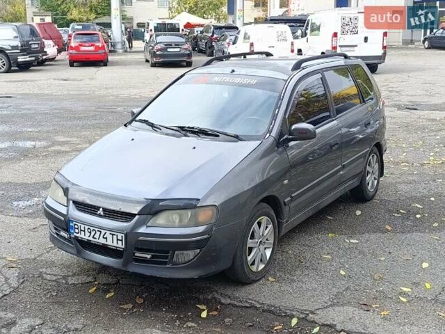 Серый Мицубиси Спейс Стар, объемом двигателя 1.6 л и пробегом 227 тыс. км за 2600 $, фото 2 на Automoto.ua