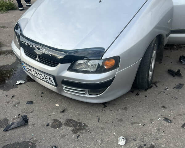 Мицубиси Спейс Стар 2004 в Сумах на Automoto.ua Серый Мицубиси Спейс Стар, объемом двигателя 1.58 л и пробегом 300 тыс. км за 1000 $, фото 1 на Automoto.ua