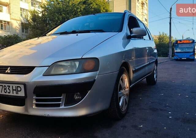 Серый Мицубиси Спейс Стар, объемом двигателя 1.3 л и пробегом 210 тыс. км за 2999 $, фото 1 на Automoto.ua
