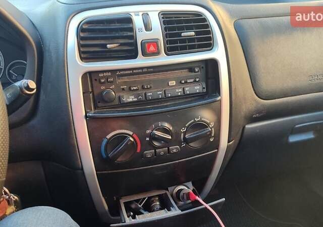 Серый Мицубиси Спейс Стар, объемом двигателя 1.3 л и пробегом 210 тыс. км за 2999 $, фото 6 на Automoto.ua