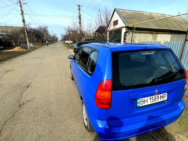 Синий Мицубиси Спейс Стар, объемом двигателя 1.3 л и пробегом 318 тыс. км за 2000 $, фото 2 на Automoto.ua