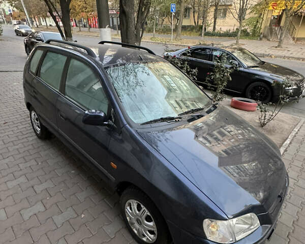 Синий Мицубиси Спейс Стар, объемом двигателя 1.3 л и пробегом 250 тыс. км за 2890 $, фото 2 на Automoto.ua
