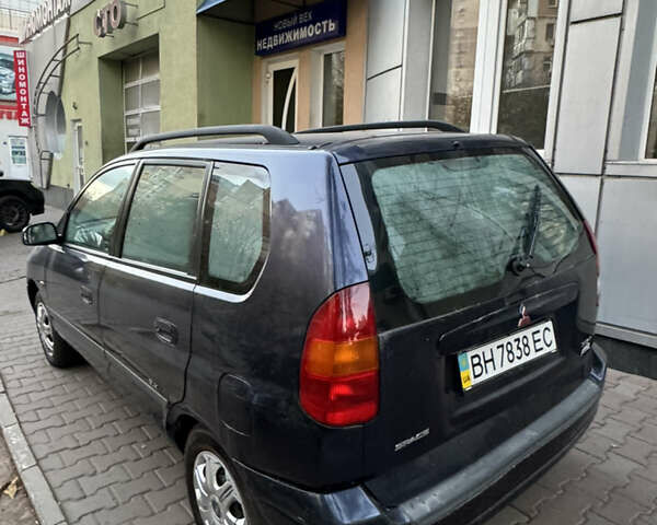 Синий Мицубиси Спейс Стар, объемом двигателя 1.3 л и пробегом 250 тыс. км за 2890 $, фото 4 на Automoto.ua