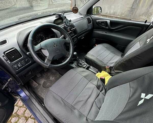 Синий Мицубиси Спейс Стар, объемом двигателя 1.58 л и пробегом 381 тыс. км за 2600 $, фото 5 на Automoto.ua