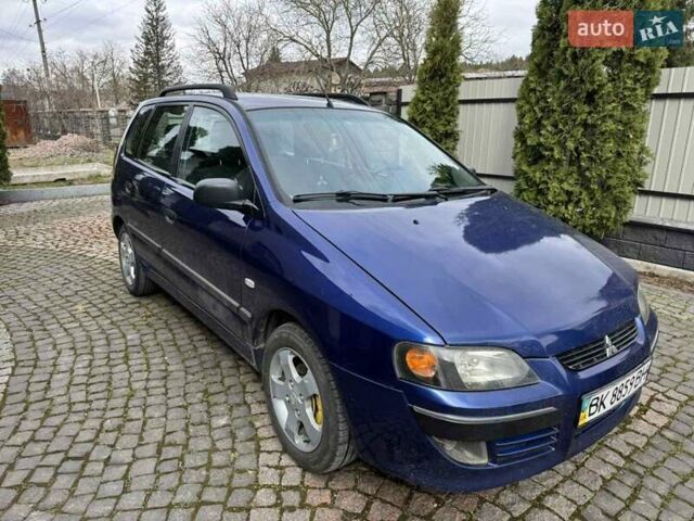 Синий Мицубиси Спейс Стар, объемом двигателя 1.58 л и пробегом 381 тыс. км за 2600 $, фото 1 на Automoto.ua