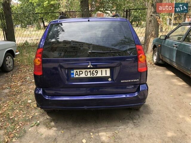 Синій Міцубісі Спейс Стар, об'ємом двигуна 1.8 л та пробігом 229 тис. км за 4000 $, фото 5 на Automoto.ua