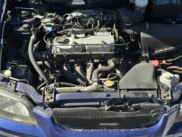 Синий Мицубиси Спейс Стар, объемом двигателя 1.6 л и пробегом 300 тыс. км за 2000 $, фото 6 на Automoto.ua