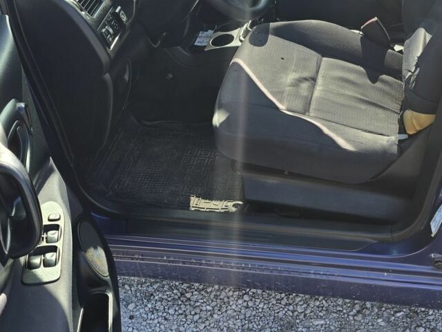 Синий Мицубиси Спейс Стар, объемом двигателя 1.6 л и пробегом 300 тыс. км за 2000 $, фото 7 на Automoto.ua