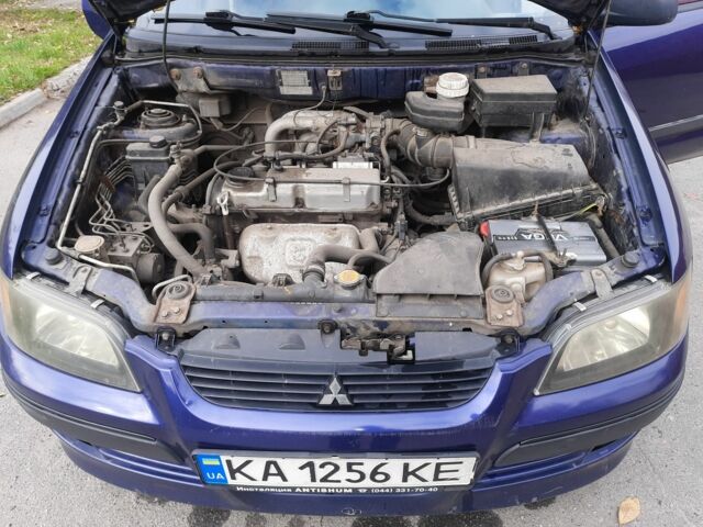 Синий Мицубиси Спейс Стар, объемом двигателя 1.6 л и пробегом 260 тыс. км за 2700 $, фото 6 на Automoto.ua