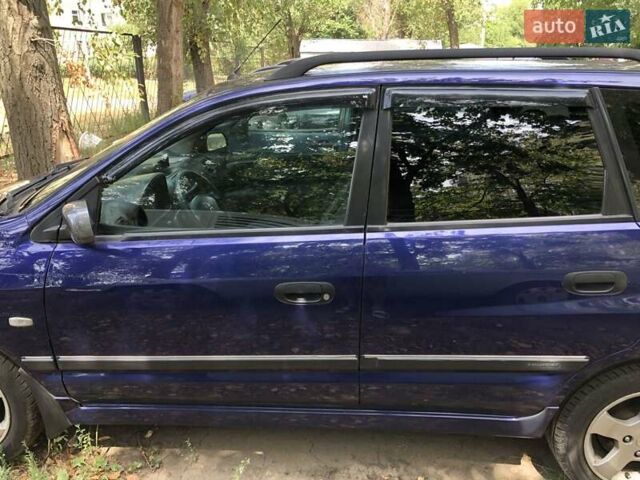 Синій Міцубісі Спейс Стар, об'ємом двигуна 1.8 л та пробігом 229 тис. км за 4000 $, фото 10 на Automoto.ua