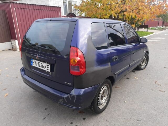 Синий Мицубиси Спейс Стар, объемом двигателя 1.6 л и пробегом 260 тыс. км за 2700 $, фото 2 на Automoto.ua