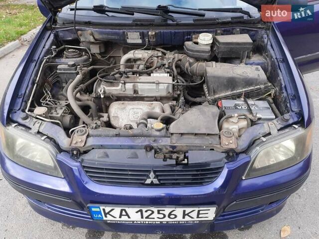 Синий Мицубиси Спейс Стар, объемом двигателя 1.6 л и пробегом 260 тыс. км за 2700 $, фото 5 на Automoto.ua