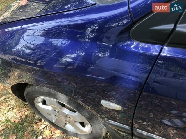 Синій Міцубісі Спейс Стар, об'ємом двигуна 1.8 л та пробігом 229 тис. км за 4000 $, фото 17 на Automoto.ua