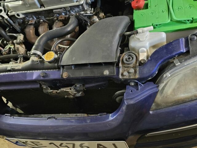 Синий Мицубиси Спейс Стар, объемом двигателя 1.6 л и пробегом 300 тыс. км за 2000 $, фото 4 на Automoto.ua