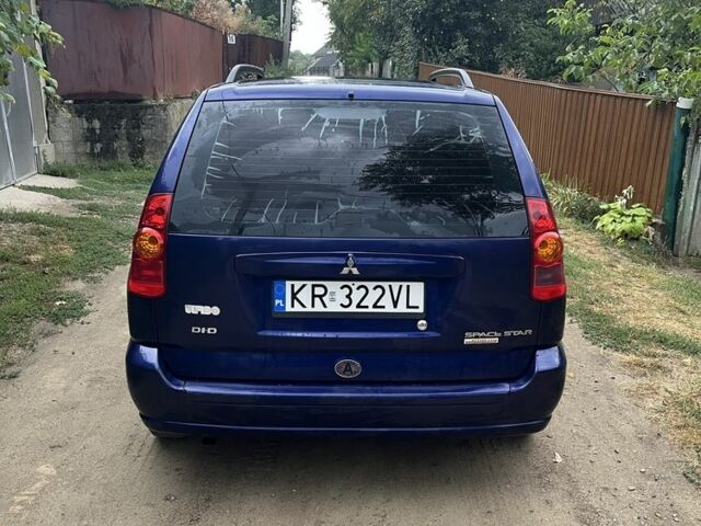 Синий Мицубиси Спейс Стар, объемом двигателя 1.9 л и пробегом 198 тыс. км за 1900 $, фото 6 на Automoto.ua