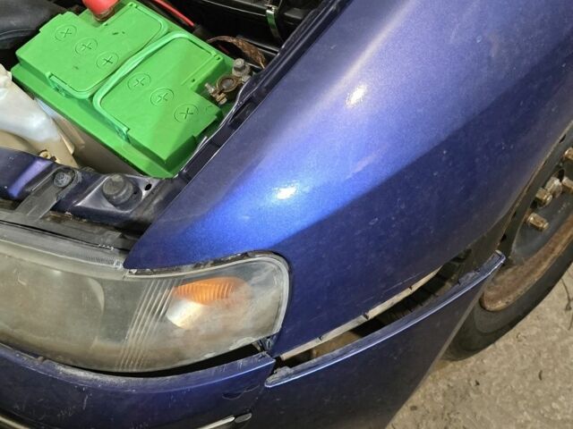 Синий Мицубиси Спейс Стар, объемом двигателя 1.6 л и пробегом 300 тыс. км за 2000 $, фото 5 на Automoto.ua