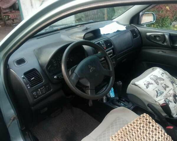 Синий Мицубиси Спейс Стар, объемом двигателя 1.6 л и пробегом 226 тыс. км за 2100 $, фото 5 на Automoto.ua