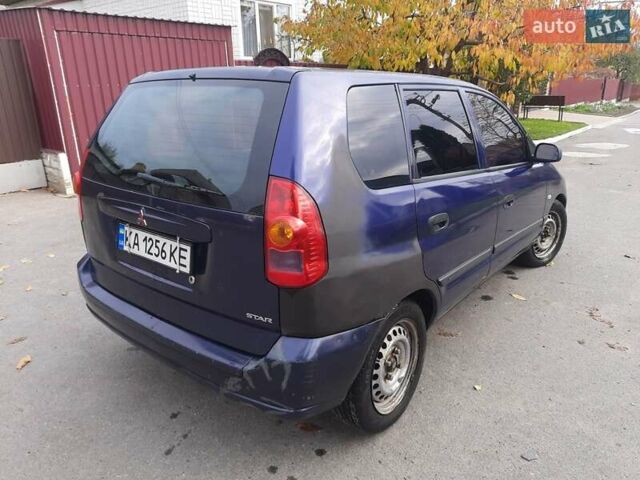 Синий Мицубиси Спейс Стар, объемом двигателя 1.6 л и пробегом 260 тыс. км за 2700 $, фото 1 на Automoto.ua