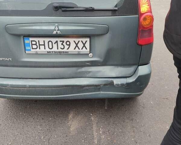 Синий Мицубиси Спейс Стар, объемом двигателя 1.6 л и пробегом 220 тыс. км за 2500 $, фото 2 на Automoto.ua