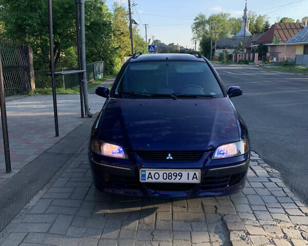 Синий Мицубиси Спейс Стар, объемом двигателя 1.58 л и пробегом 235 тыс. км за 2599 $, фото 2 на Automoto.ua